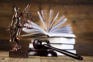 Columbia Wrongful Death Lawyer with scale, a gavel, and books