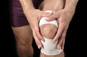 Columbia Personal Injury Lawyer with a man holding his knee