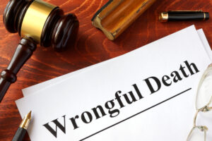 Attorney Assistance: Wrongful Death - table gavel and legal documents